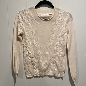 Anthropologie Angel of the North light weight cream sweater with lace overlay.
